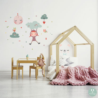 Vinilo infantil columpiando entre las nubes imagine